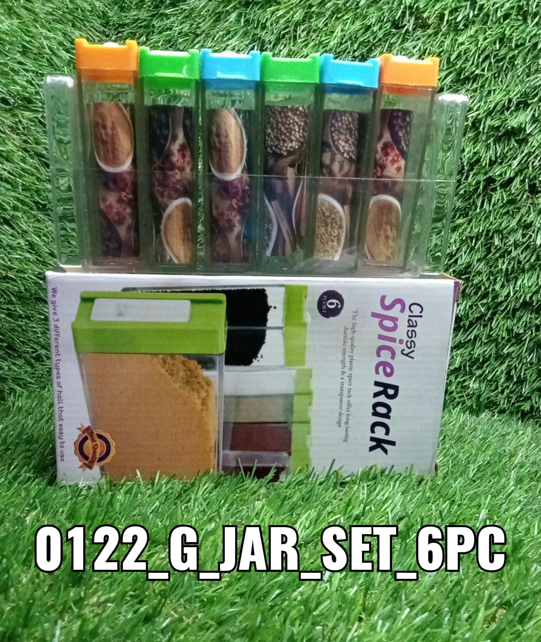 Assorted plastic spice jars with bright, colorful lids Assorted plastic spice jars with bright, colorful lids
